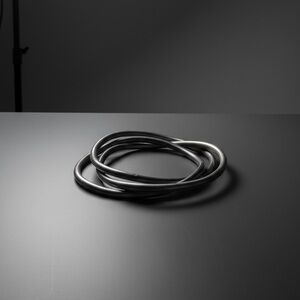 Vintage silver bracelet composed of three interlocking wavy bangles